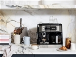 De’Longhi All‑In‑One Combination Coffee & Espresso Machine COM532M with digital touchscreen, advanced steam wand, and 10‑cup carafe in stainless steel